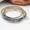 Pom Silver Plated and Faux Gold Blue Mix Crystal Five Bracelet Pom Silver Plated and Faux Gold Blue Mix Crystal Five Bracelet