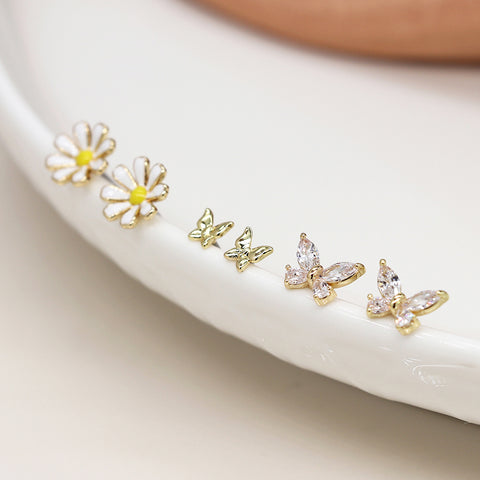 Pom Gold Plated Enamelled Daisy, Gold Plated Butterfly and Crystal Butterfly Studs