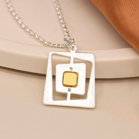 Pom Brushed Silver Plated Offset Square Pendant Necklace with Gold Centre