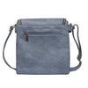 Long & Son denim blue faux-leather crossbody bag with a front flap, gold-tone hardware, and two matching tassel zip pulls rear view. Long & Son denim blue faux-leather crossbody bag with a front flap, gold-tone hardware, and two matching tassel zip pulls rear view.