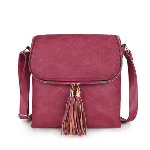 Long and Son rose faux-leather crossbody bag with a front flap, gold-tone zipper, and matching rose tassels.