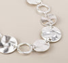 PoM Silver Plated Worn Discs and Hoops Necklace closeup PoM Silver Plated Worn Discs and Hoops Necklace closeup