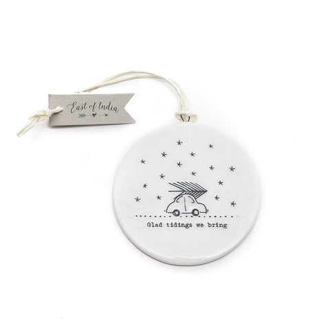 East of India 'Glad Tidings we bring' Flat Ceramic Bauble front car with christmas tree