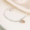Pom Silver Plated Bead Bracelet with Faux Gold Paw Print with Crystals