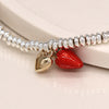 Pom Silver Plated Bracelet with Enamel Strawberry and Gold Heart Charm