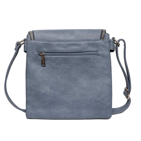 Long & Son denim blue faux-leather crossbody bag with a front flap, gold-tone hardware, and two matching tassel zip pulls rear view.