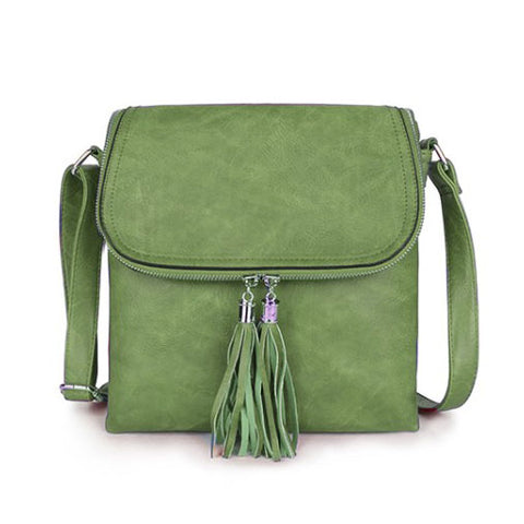 Long and Son green faux-leather crossbody bag with a front flap, zippered closure and decorative tassels 