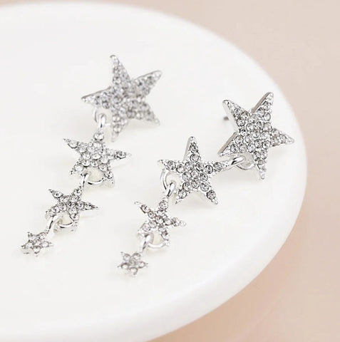 Pom Graduated Crystal Silver Star Earrings