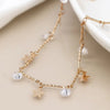 PoM Faux Gold Multi Coloured Stars and Crystals Station Necklace closeup