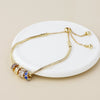 PoM Faux Gold Multi Ring Snake Necklace Side View